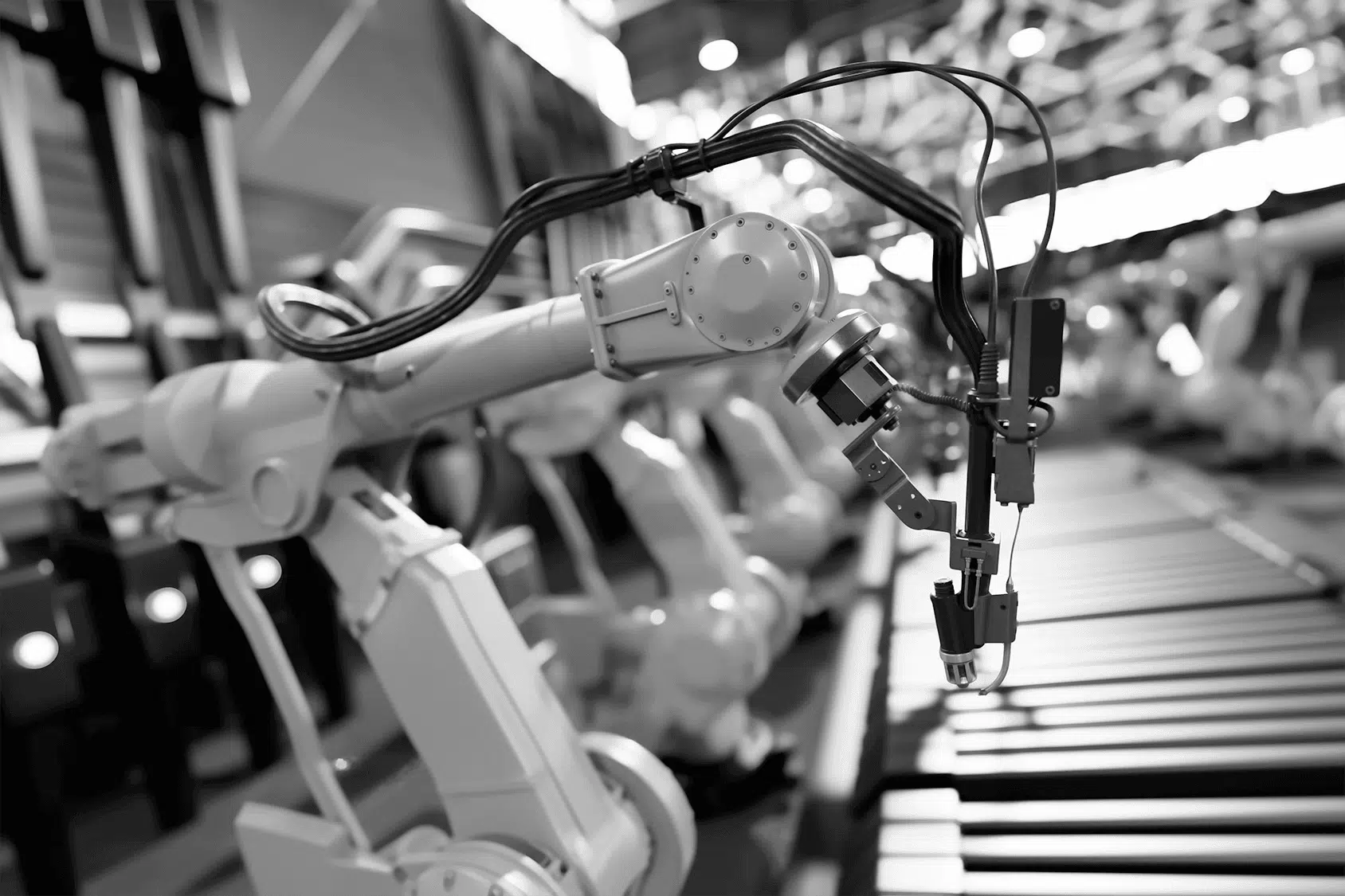 robotic-arms-along-assembly-line-in-modern-factory-QBNWXRK